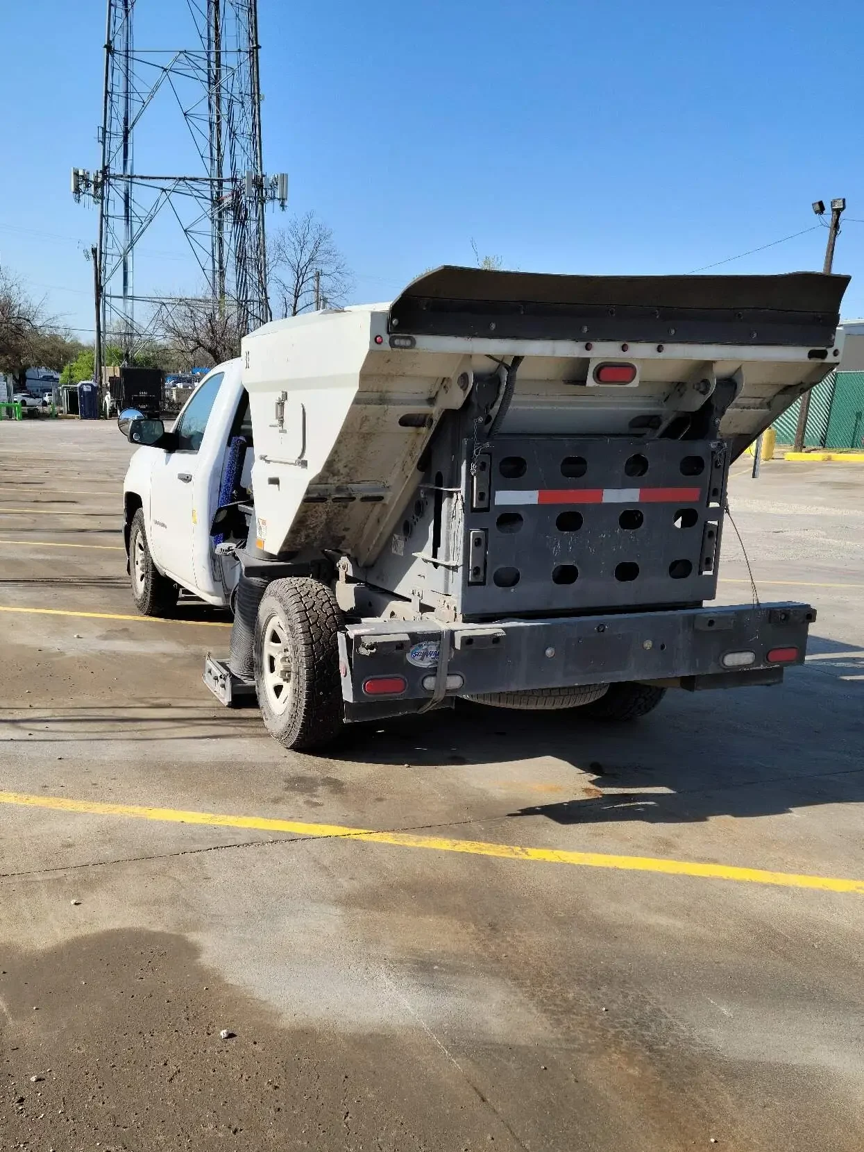 Commercial parking lot sweeping and power sweeping parking lots in Dallas, Texas.